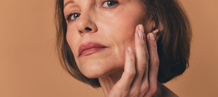 Woman with reduced TMJ pain after Botox injection in West Orange, NJ